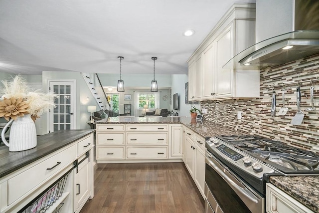 1 Woodland Ct Unit B, Milford, MA 01757 - kitchen with stainless steel range with gas cooktop, wall chimney range hood, backsplash, dark wood finished floors, and open floor plan