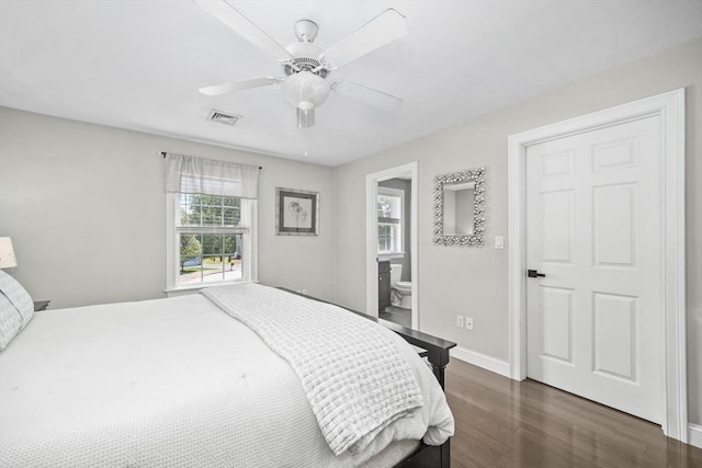 1 Woodland Ct Unit B, Milford, MA 01757 - bedroom with dark wood-style flooring, a ceiling fan, and ensuite bath