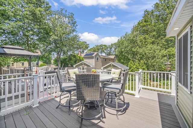 1 Woodland Ct Unit B, Milford, MA 01757 - wooden deck featuring a gazebo and outdoor dining area