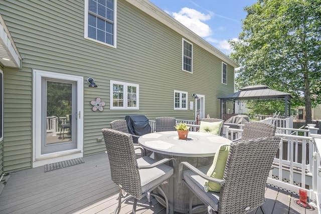 1 Woodland Ct Unit B, Milford, MA 01757 - wooden deck featuring a gazebo and outdoor dining area