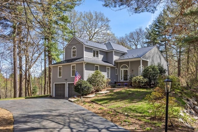 65 Sheffield Ter, Marlborough, MA 01752 - view of front of home featuring asphalt driveway and a garage