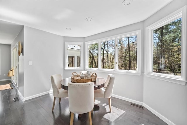 65 Sheffield Ter, Marlborough, MA 01752 - dining area with baseboards and dark wood-type flooring