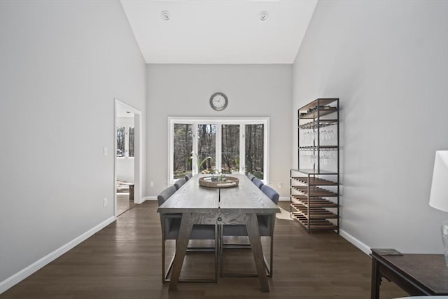 65 Sheffield Ter, Marlborough, MA 01752 - dining room with a high ceiling, baseboards, and dark wood finished floors