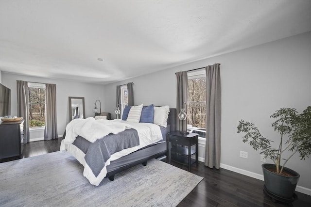 65 Sheffield Ter, Marlborough, MA 01752 - bedroom with multiple windows, baseboards, and dark wood finished floors