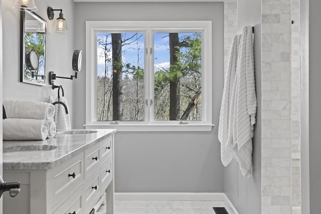 65 Sheffield Ter, Marlborough, MA 01752 - bathroom featuring baseboards and vanity
