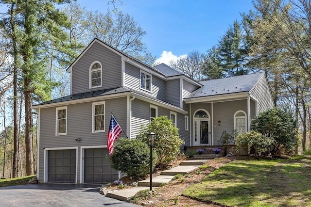 65 Sheffield Ter, Marlborough, MA 01752 - view of front facade featuring an attached garage and asphalt driveway