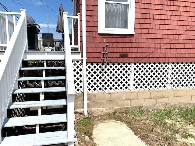 114 Long Bch, Rockport, MA 01966 - view of side of property with stairway and fence