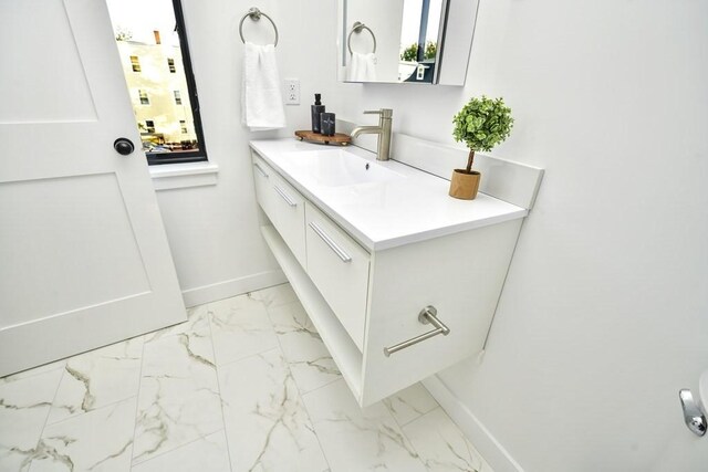 bathroom with vanity and tile patterned flooring