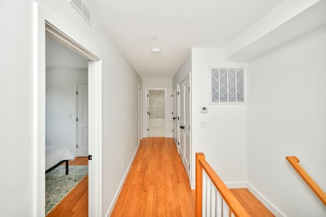 hall featuring light hardwood / wood-style floors