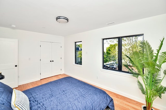 bedroom featuring light wood-type flooring