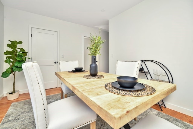 dining room featuring light hardwood / wood-style flooring