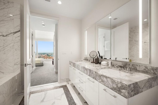 240 Devonshire St Unit 4003, Boston, MA 02110 - full bathroom with marble finish flooring, recessed lighting, double vanity, and ensuite bathroom