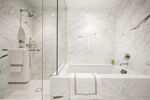 240 Devonshire St Unit 4003, Boston, MA 02110 - full bath featuring a marble finish shower, a garden tub, and tile walls