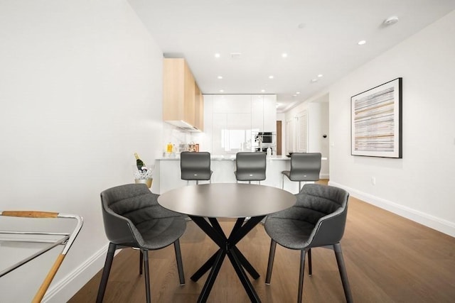 240 Devonshire St Unit 4003, Boston, MA 02110 - dining area with light wood-style flooring and recessed lighting