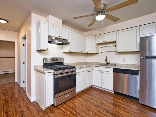 3652 N Main St Unit 4, Fall River, MA 02720 - kitchen featuring appliances with stainless steel finishes, under cabinet range hood, white cabinetry, and dark wood finished floors