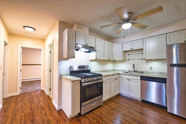3652 N Main St Unit 4, Fall River, MA 02720 - kitchen with appliances with stainless steel finishes, under cabinet range hood, baseboard heating, light countertops, and ceiling fan