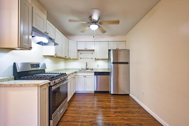 3652 N Main St Unit 4, Fall River, MA 02720 - kitchen with appliances with stainless steel finishes, under cabinet range hood, a ceiling fan, light countertops, and dark wood-type flooring