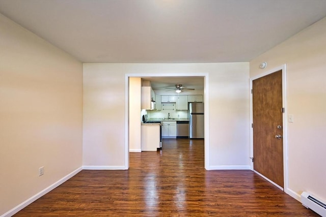 3652 N Main St Unit 4, Fall River, MA 02720 - unfurnished living room with a baseboard radiator, dark wood-style flooring, and ceiling fan