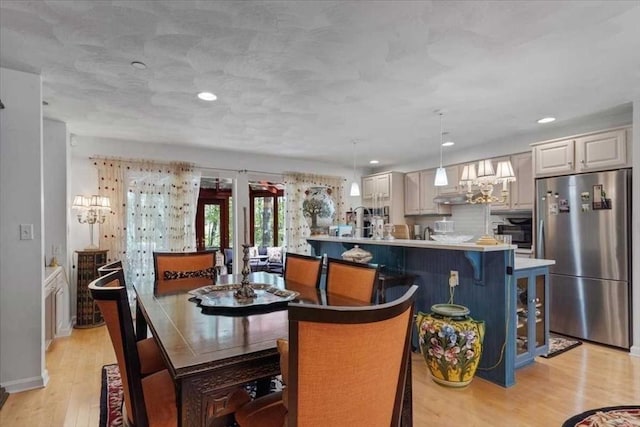 8 Deer Path Unit 8, Hudson, MA 01749 - dining room featuring light wood-style floors and recessed lighting