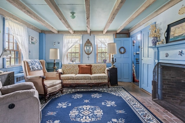 living area with beam ceiling