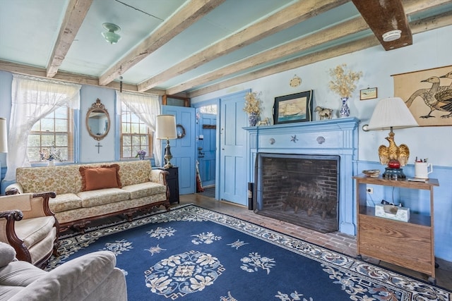 living room featuring beam ceiling