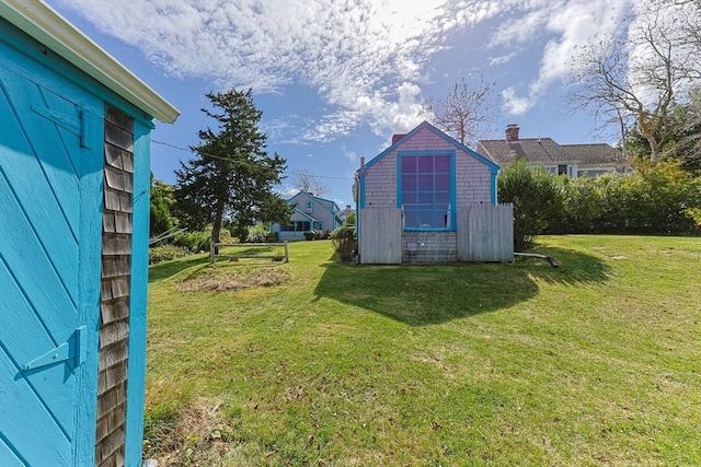 view of yard with a storage shed