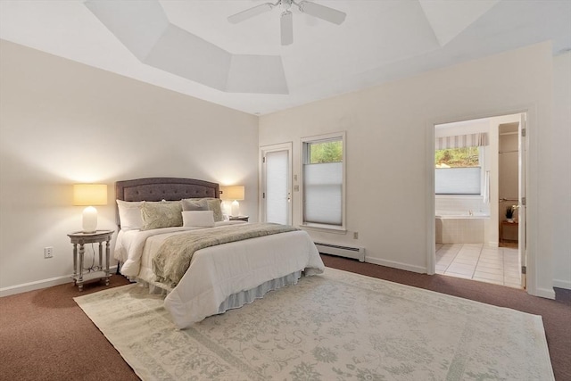 carpeted bedroom with multiple windows, a baseboard radiator, and baseboards