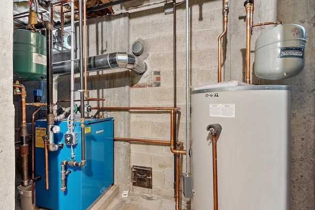 utilities featuring water heater and a heating unit