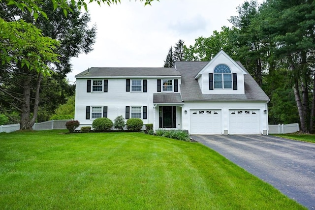3 Alcorn Rd, Chelmsford, MA 01824 - view of front facade featuring driveway and a garage