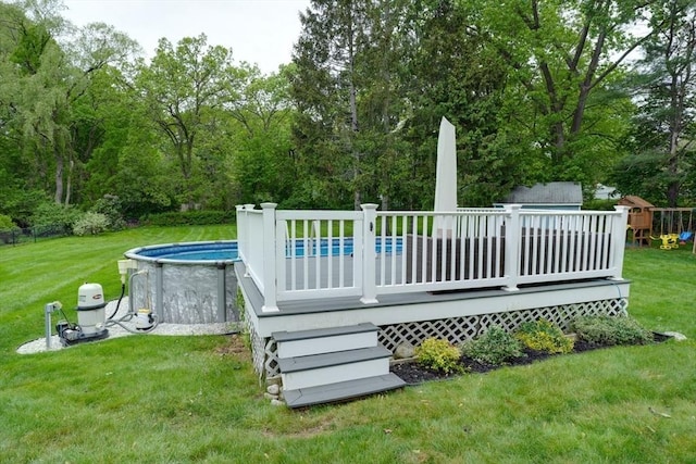 3 Alcorn Rd, Chelmsford, MA 01824 - wooden deck featuring an outdoor pool and a lawn