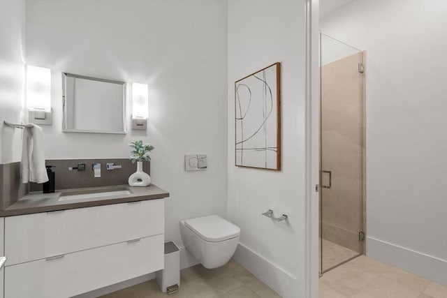 bathroom with tile patterned flooring, vanity, toilet, and walk in shower