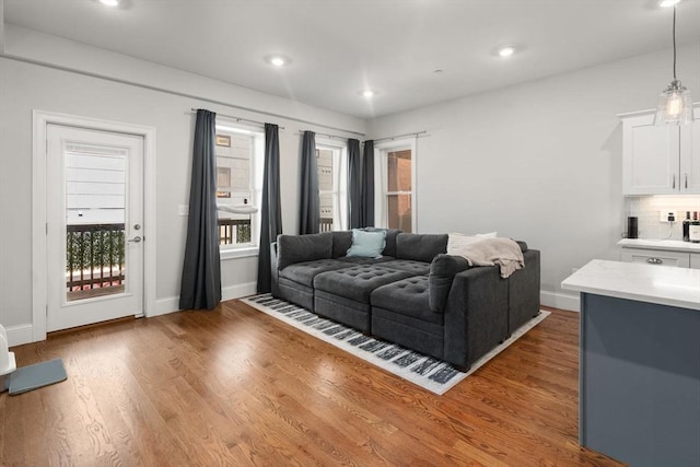 338 Meridian St Unit 2, Boston, MA 02128 - living area featuring wood finished floors and recessed lighting