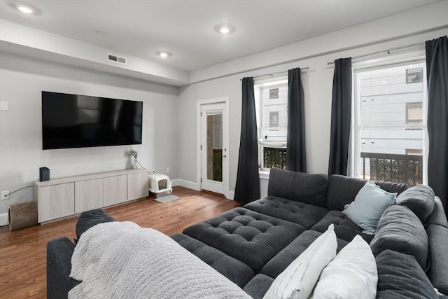 338 Meridian St Unit 2, Boston, MA 02128 - living room featuring wood finished floors, plenty of natural light, and recessed lighting