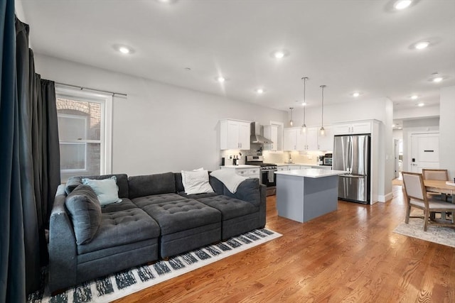 338 Meridian St Unit 2, Boston, MA 02128 - living area featuring light wood-style flooring and recessed lighting