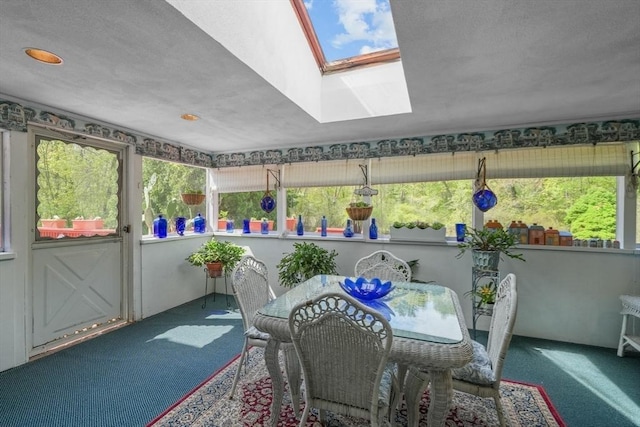 sunroom featuring a skylight