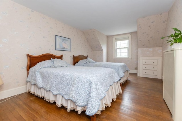 504 Mount Auburn St, Watertown, MA 02472 - bedroom with wallpapered walls and wood finished floors