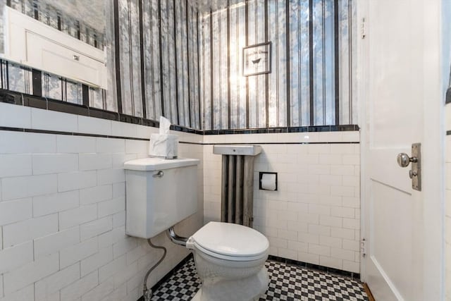 504 Mount Auburn St, Watertown, MA 02472 - bathroom with tile patterned floors, tile walls, and plenty of natural light