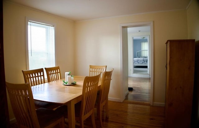 96 Harris St, Methuen, MA 01844 - dining room featuring wood finished floors and crown molding