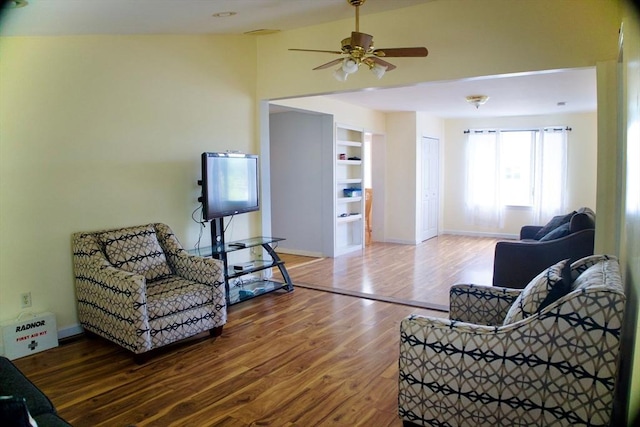 96 Harris St, Methuen, MA 01844 - living room with vaulted ceiling, wood finished floors, a ceiling fan, and built in features