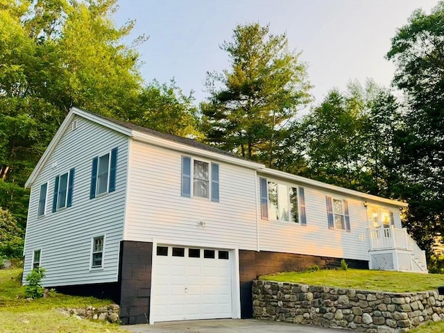 96 Harris St, Methuen, MA 01844 - view of front facade featuring a garage, a front lawn, and driveway
