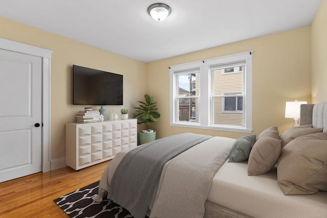 bedroom with light hardwood / wood-style flooring