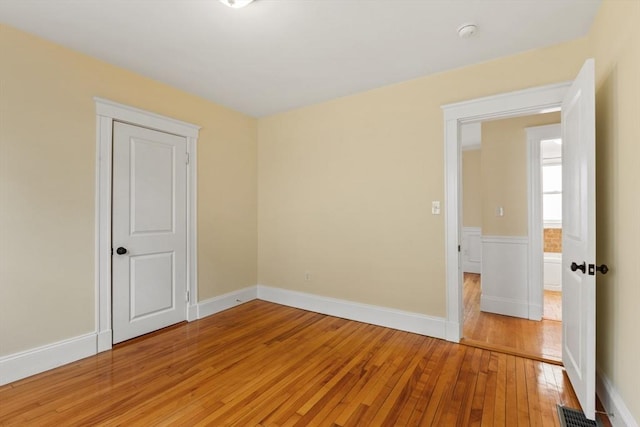 unfurnished room featuring light hardwood / wood-style flooring