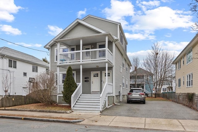 view of front of home featuring a balcony