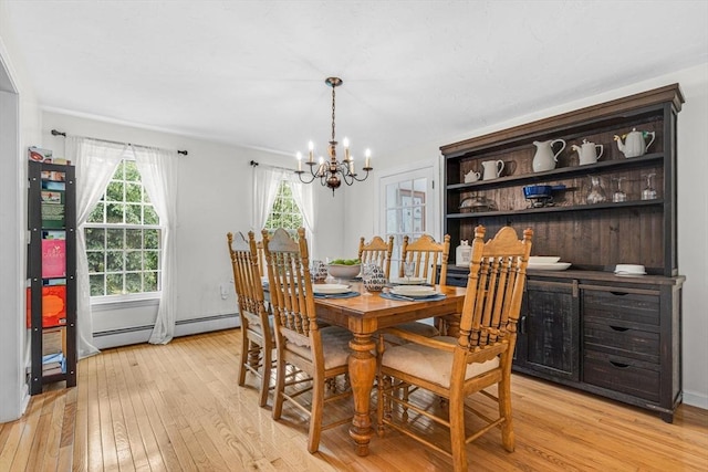 31 Alexander Rd, Hopkinton, MA 01748 - dining area with light wood-type flooring and a chandelier