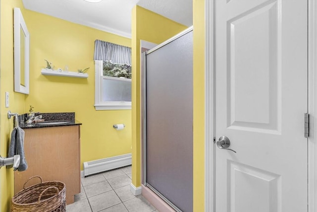 31 Alexander Rd, Hopkinton, MA 01748 - full bathroom featuring baseboard heating, a shower stall, vanity, tile patterned flooring, and baseboards