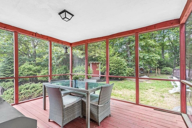 31 Alexander Rd, Hopkinton, MA 01748 - sunroom / solarium with outdoor dining space, healthy amount of natural light, and view of scattered trees