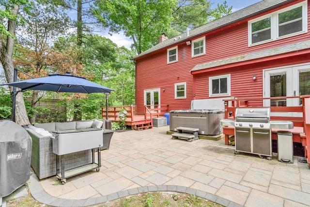 31 Alexander Rd, Hopkinton, MA 01748 - view of patio featuring a hot tub, french doors, area for grilling, a deck, and an outdoor hangout area