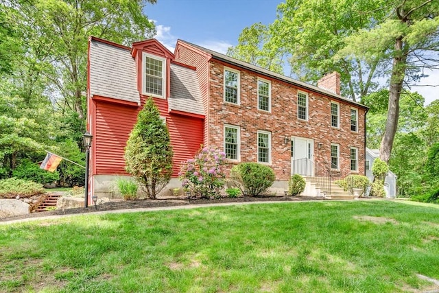 31 Alexander Rd, Hopkinton, MA 01748 - colonial home featuring a chimney, a front yard, and entry steps