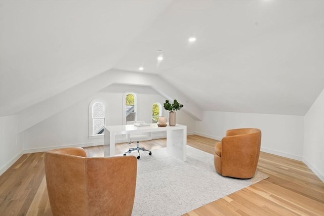 office featuring vaulted ceiling, baseboards, wood finished floors, and recessed lighting