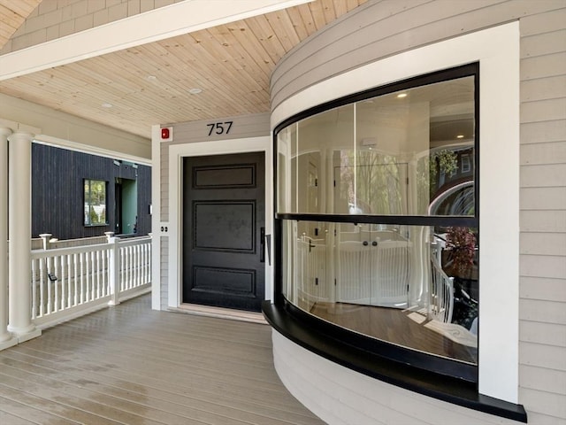 entrance to property with covered porch